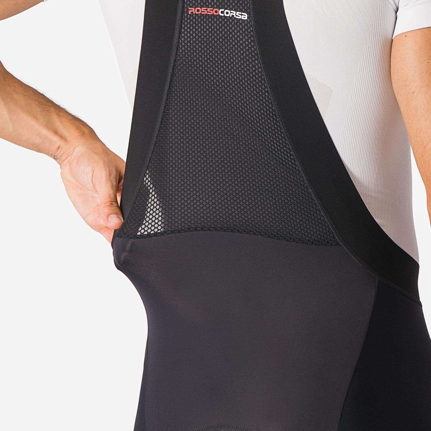 Castelli overtaking Ros 2024 dungarees